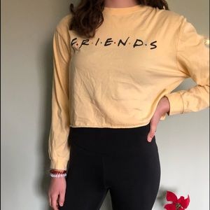 Cropped long sleeve yellow F•R•I•E•N•D•S shirt